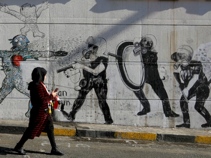 FOTO: Demonstran Irak Protes Lewat Seni Mural