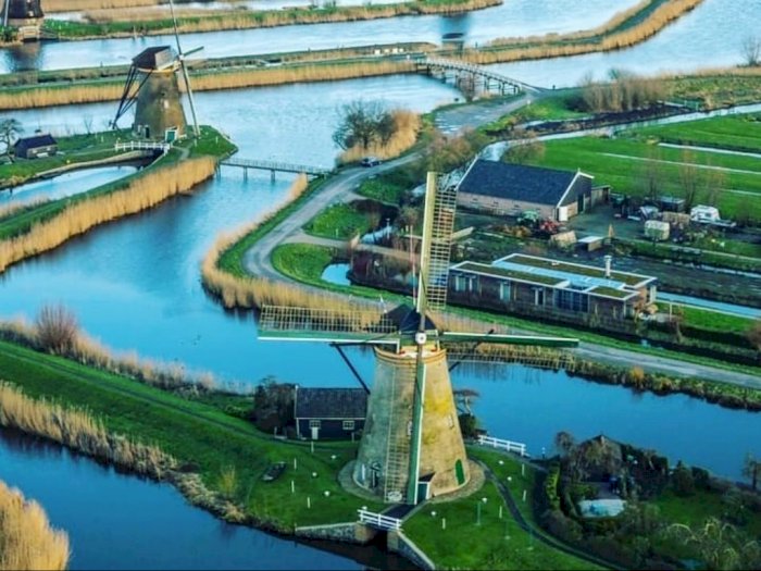 FOTO: Keindahan Desa Kincir Angin Kinderdijk di Belanda