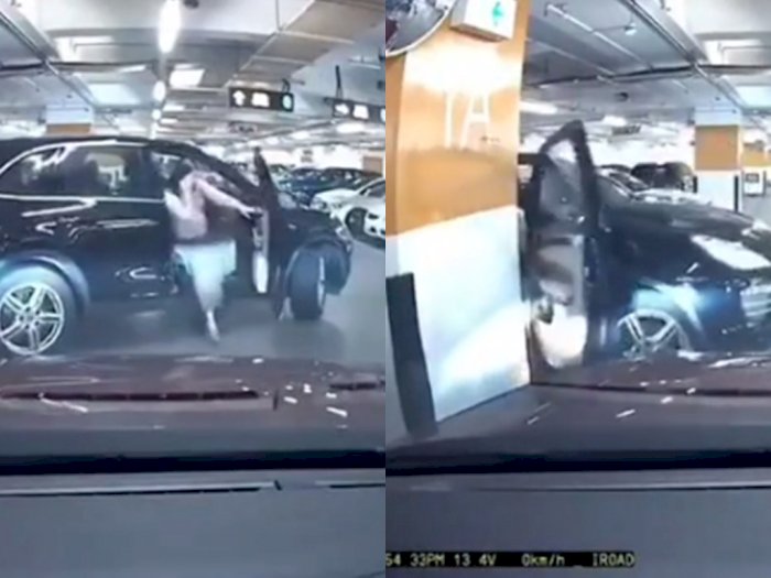 Lupa Menarik Rem Tangan saat Parkir, Pintu Mobil Wanita ini Patah Karena Mundur Tiba-tiba