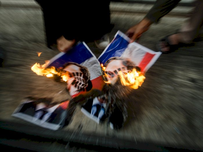 FOTO: Unjuk Rasa Kecam Presiden Prancis