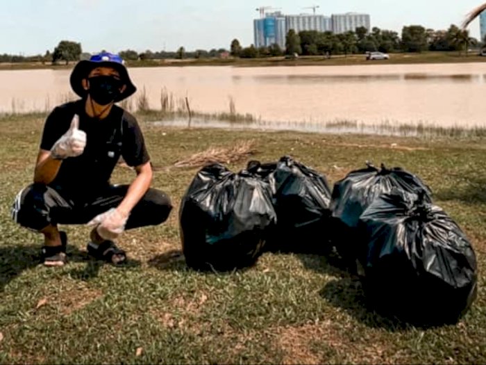 Pria Ini Rayakan Ulang Tahun ke-31 dengan Memungut Sampah di Sekitar Danau yang Kotor