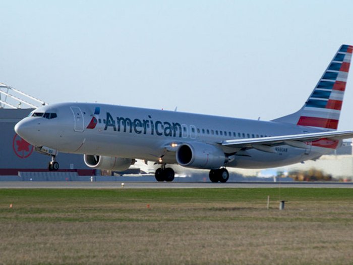 COVID-19 Melonjak, American Airlines Tak Lagi Sajikan Alkohol Hingga 2022!