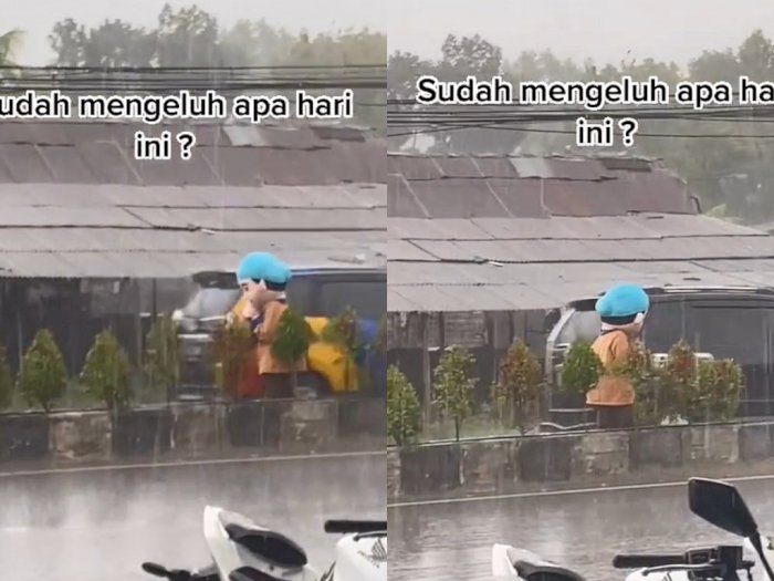 Pilu! Boneka Badut Ini Tetap Berjuang Mencari Rezeki,  Meski Diguyur Hujan