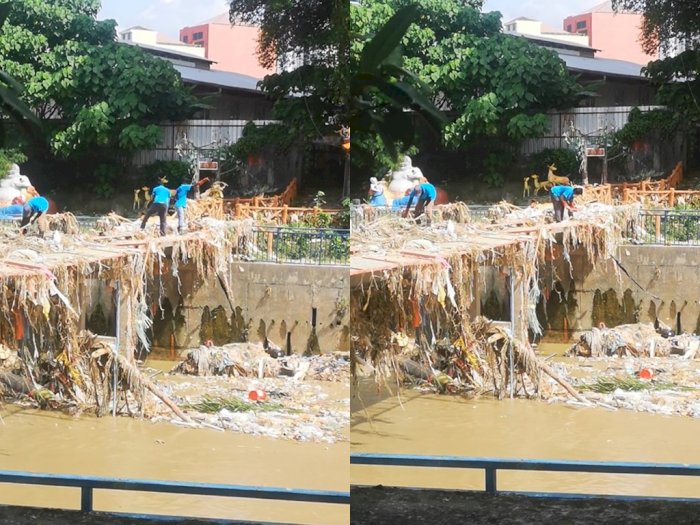 Pungut Sampah Berserakan, Petugas Kebersihan Ini  Malah Buang Sampah ke Sungai