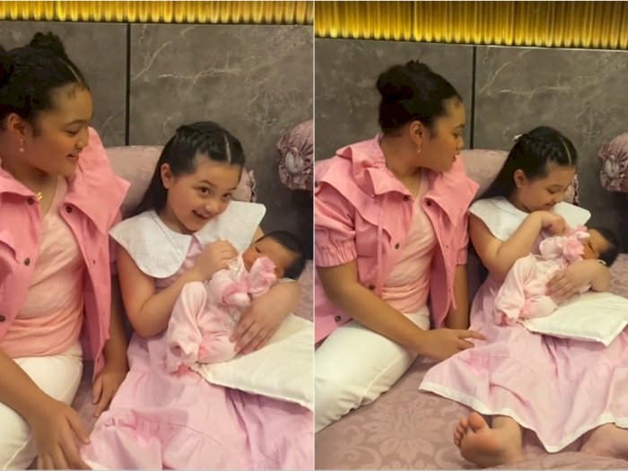 Momen Menggemaskan Arsy Gendong Baby Ameena, Luwes Banget Kayak Orang Dewasa
