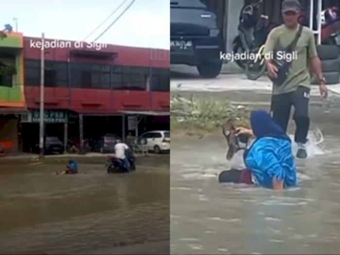 Akibat Ngebut Saat Terobos Banjir, Ibu-ibu Ini Jatuh dari Motor Hingga Basah Kuyup