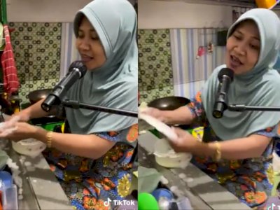 Kocak! Emak-emak Nyuci Piring Sambil Asyik Karaoke, Netizen Ngakak: Real Dapur Rekaman