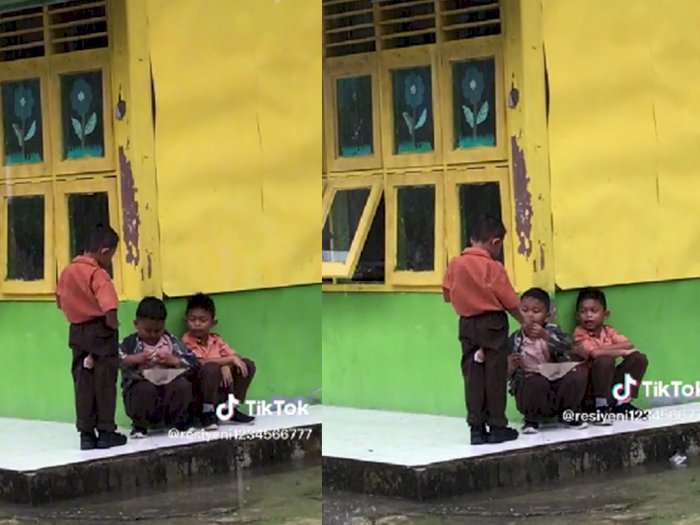 Bikin Terenyuh! Momen Manis Tiga Bocah SD Berbagi Makanan saat Hujan, Warganet Mewek