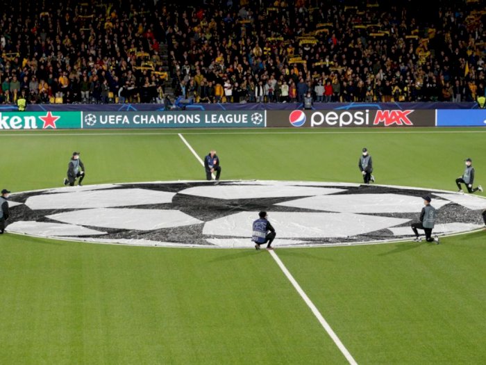 Saking Senangnya, Tangan Pria Ini Mati Rasa saat Jadi Pengibar Bendera Liga Champions
