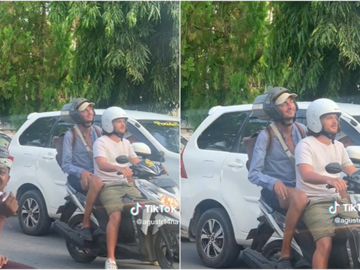 Naik Motor di Bali, Helm Bule Ini Kacanya Hampir Lepas: Emang Random Banget