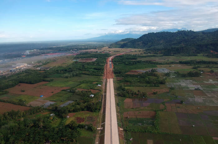 ANTARA FOTO/Iggoy el Fitra Foto udara pembangunan ruas jalan tol Padang - Pekanbaru di Nagari Kasang
