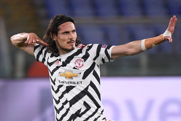 Edinson Cavani dari Manchester United merayakan mencetak gol kedua mereka (REUTERS/Alberto Lingria) Edinson Cavani dari Manchester United merayakan mencetak gol kedua mereka
