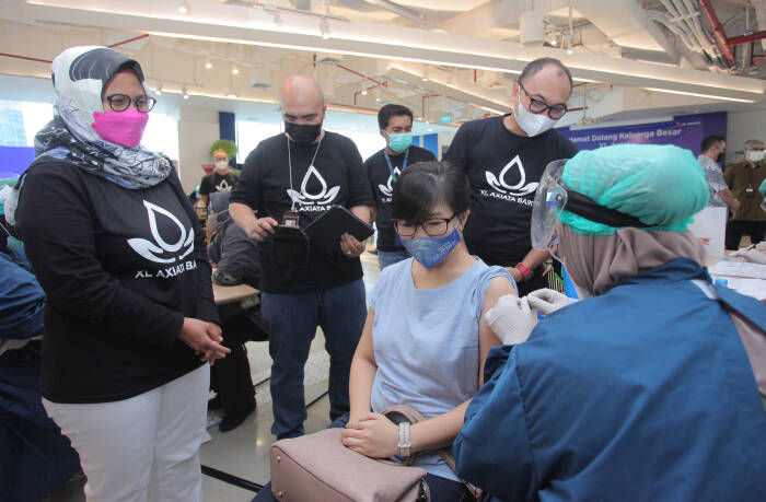 ANTARA FOTO/ Reno Esnir PROGRAM VAKSIN GOTONG ROYONG XL AXIATA